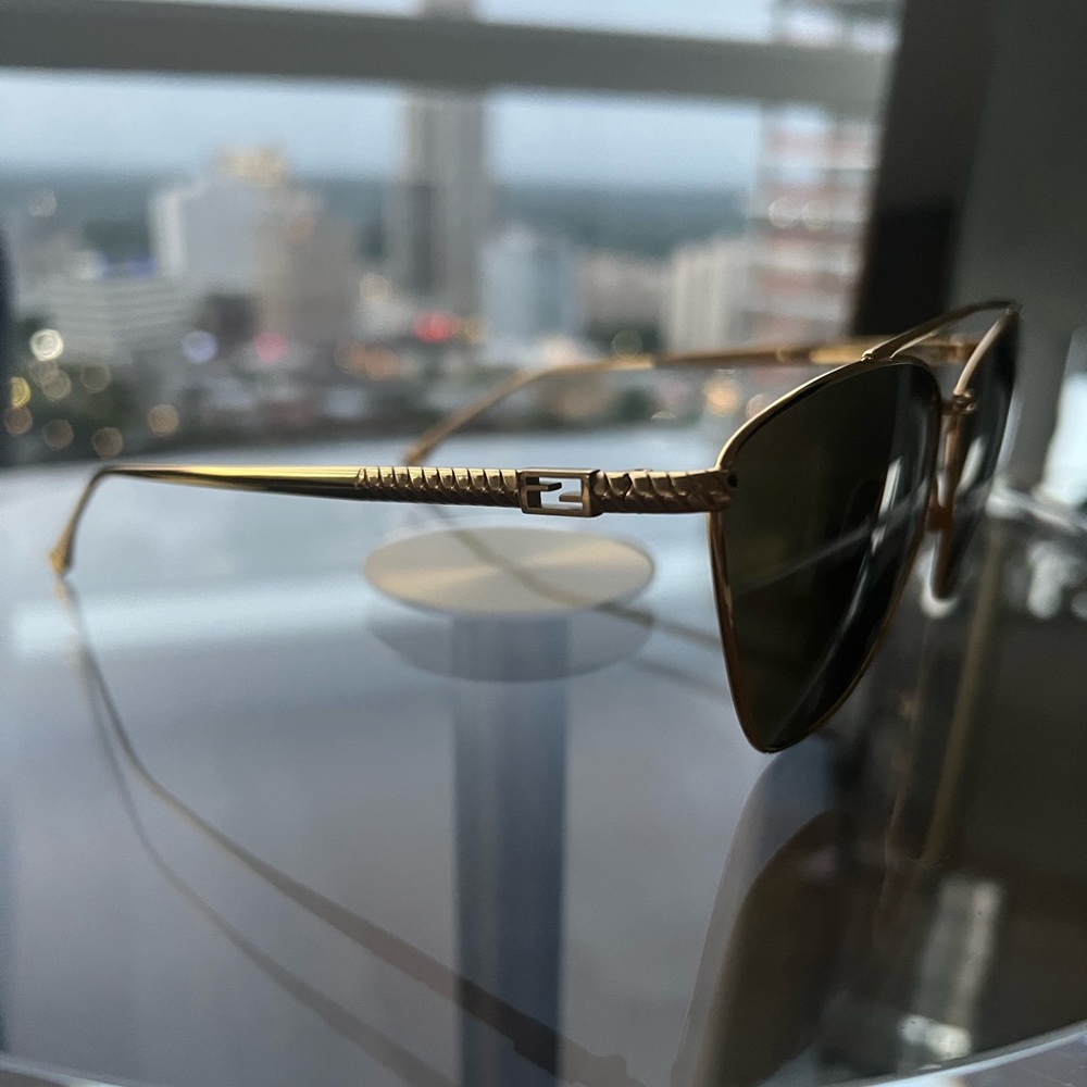 Brand new FENDI shades! I have too many and never wear.